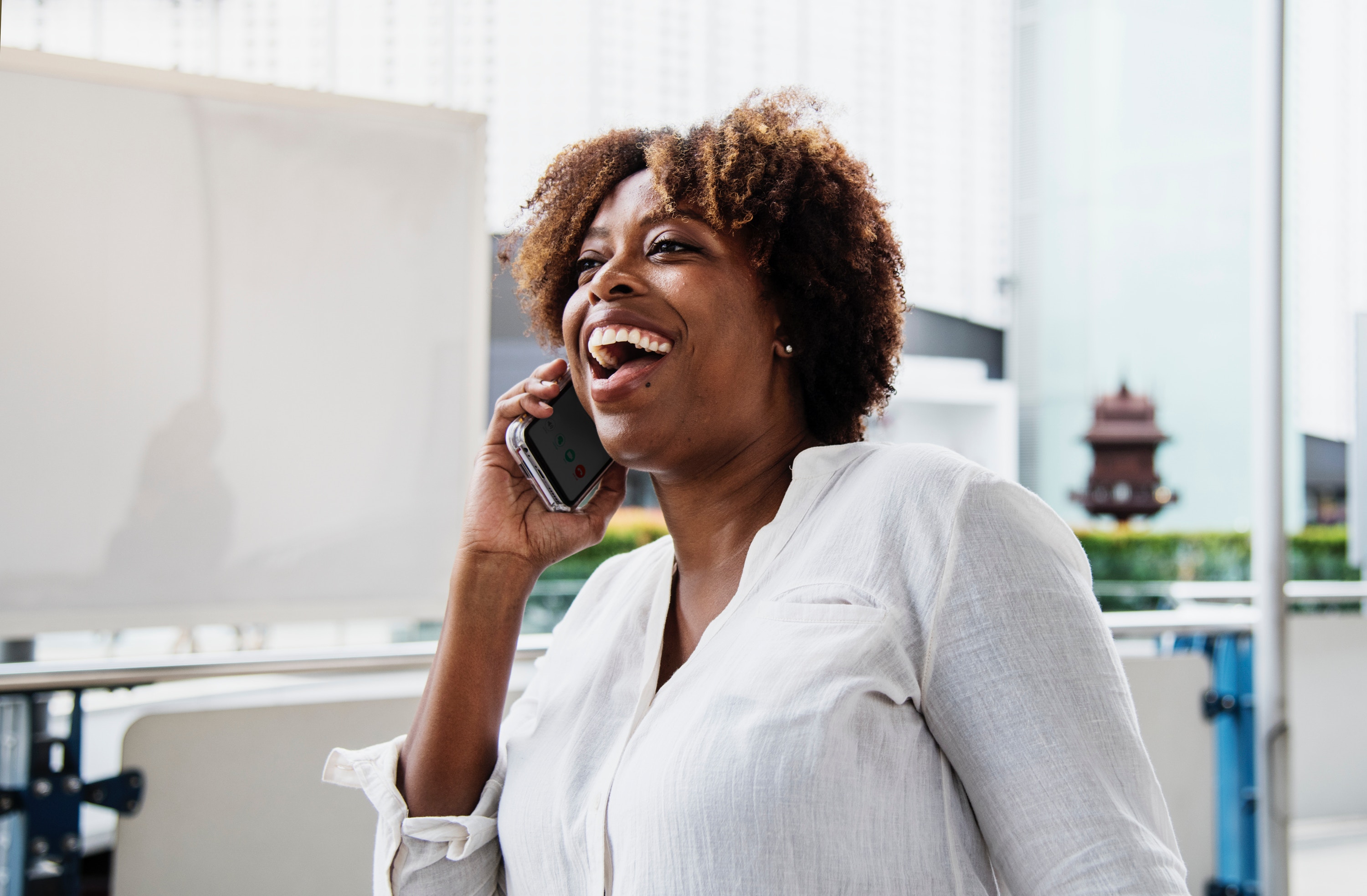 Woman happy talking on the phone